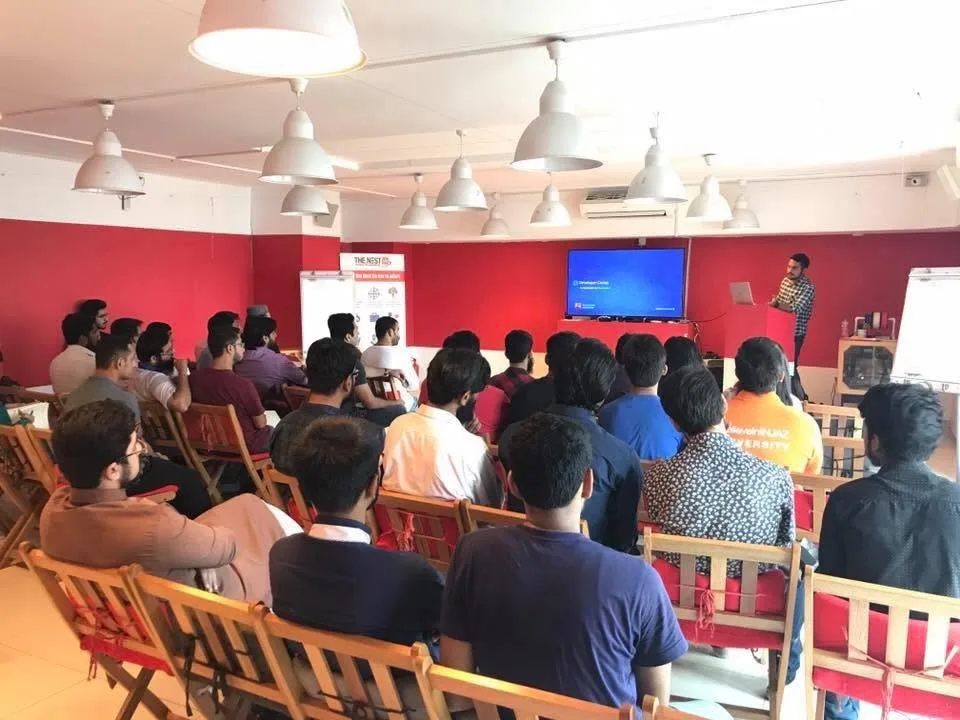 Ishaq Hassan speaking to a full house at The Nest I/O, Karachi